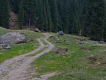 Winding road with car parked at the top