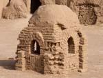 Small mud brick structure outside Narin Castle